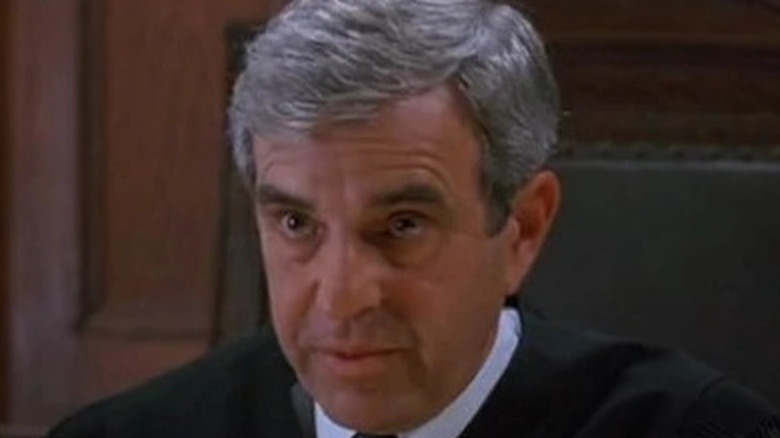 David Rosenbaum wears a judge's robe 
