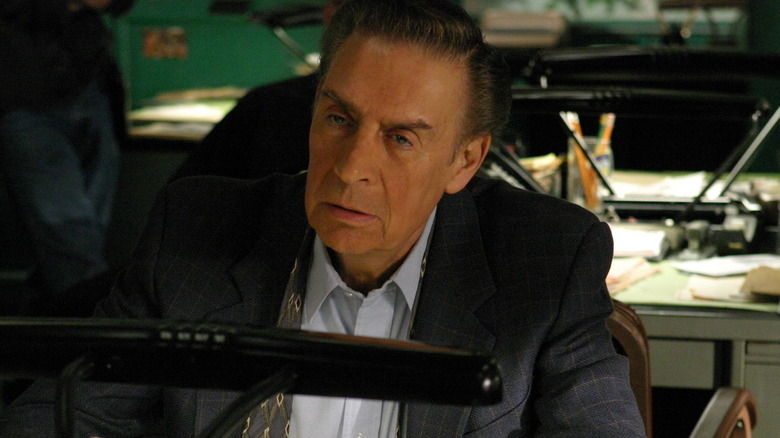 Lennie Briscoe sits at his desk on "Law & Order"