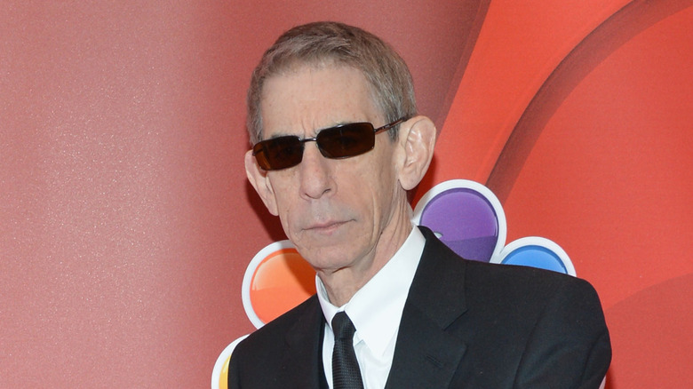 Richard Belzer wears sunglasses