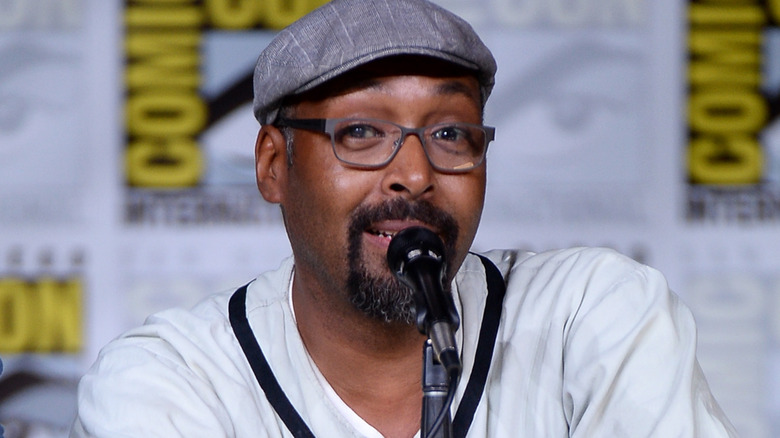 Jesse L. Marting sitting behind a microphone