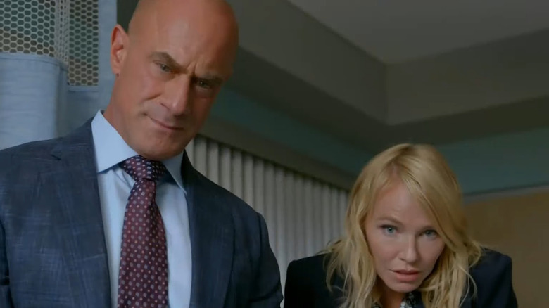 Rollins and Stabler talking to patient 