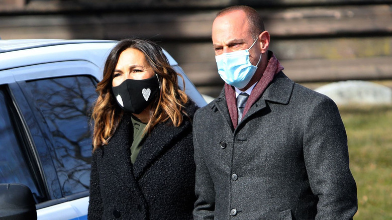 Stabler and Benson wearing face masks outside