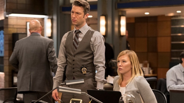 Carisi stands next to Rollins