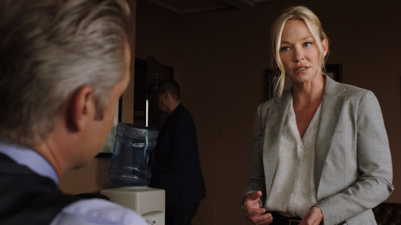 Kelli Giddish speaking to her boss