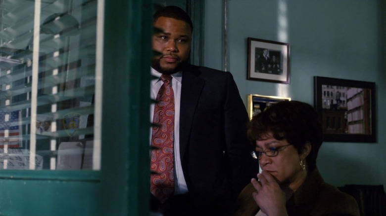 Anthony Anderson and S. Epatha Merkerson looking contemplative