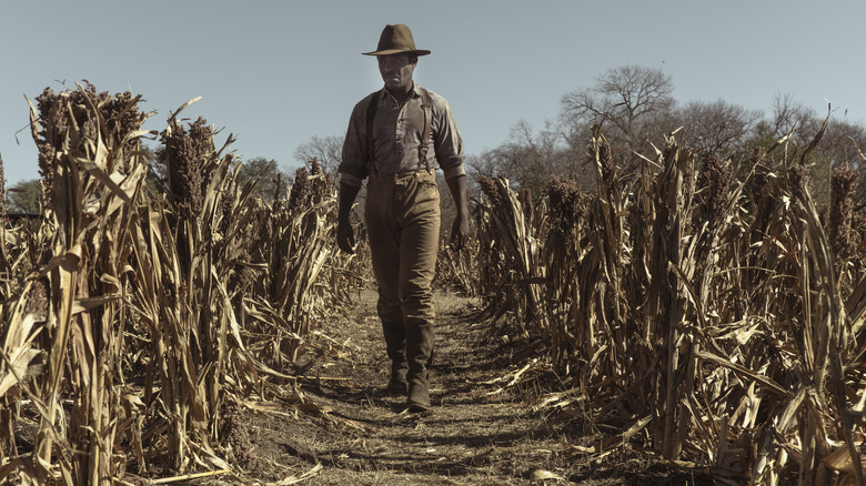 Bass Reeves walking through field