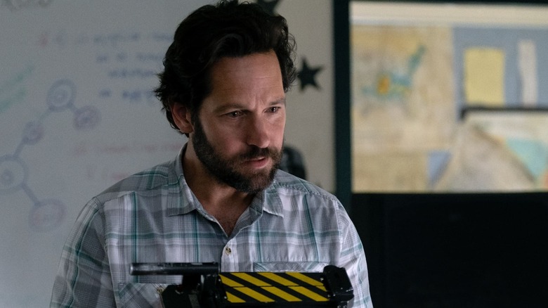 Paul Rudd holds Ghostbusters tech