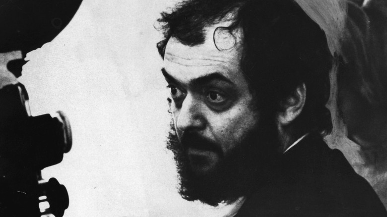 Stanley Kubrick looking through a camera