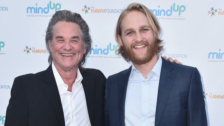 Kurt and Wyatt Russell smile