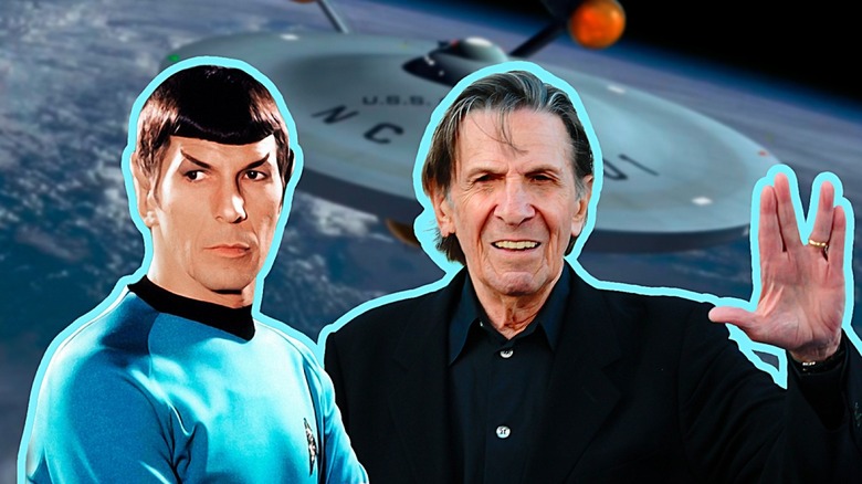 Nimoy holds up the Vulcan salute