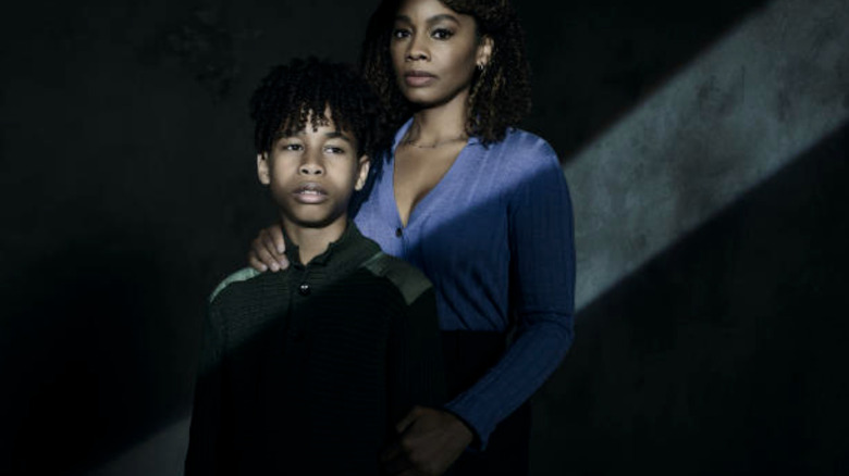 Ian Foreman and Anika Noni Rose as Isaiah and Naomi Cole