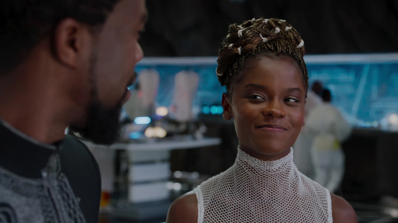 Shuri smiling at T'Challa