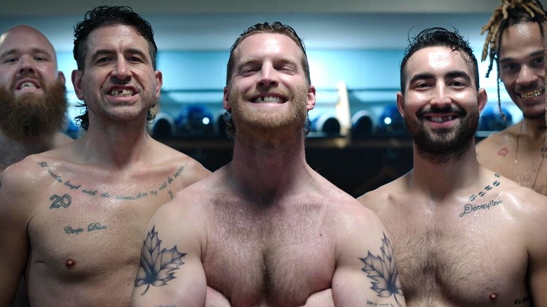 Shoresy and hockey players smiling shirtless and toothless