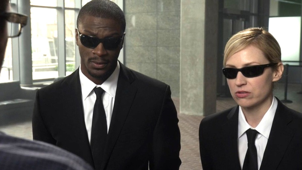 Hardison and Parker wear sunglasses