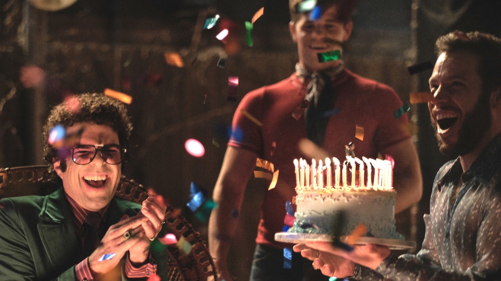 Zachary Quinto with a cake