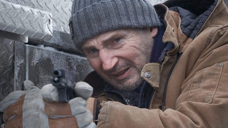 Liam Neeson Mike pointing gun 