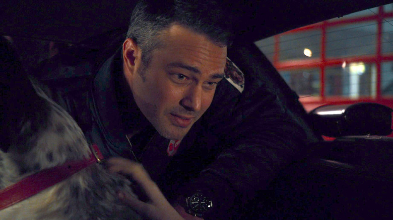 Kelly Severide holding Pouch