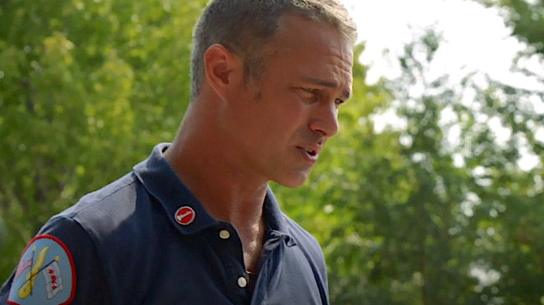 Kelly Severide talking outdoors