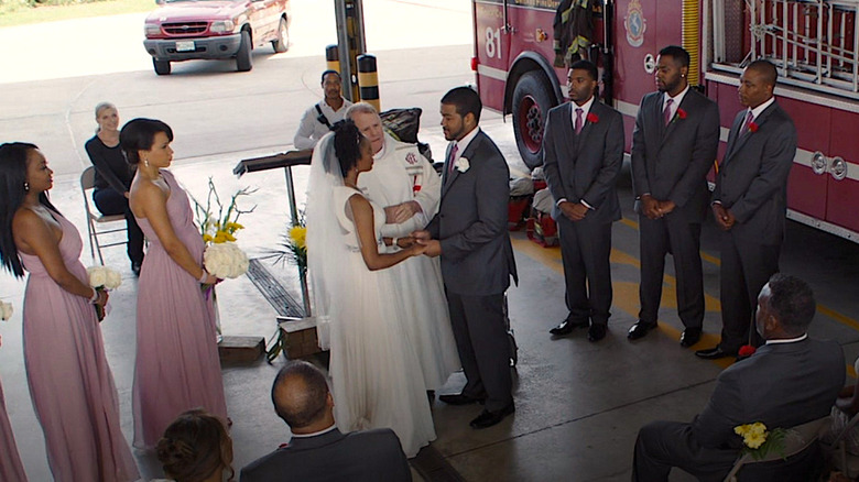 Bride and groom in firehouse