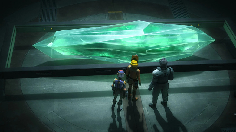 Characters observing a giant kyber crystal