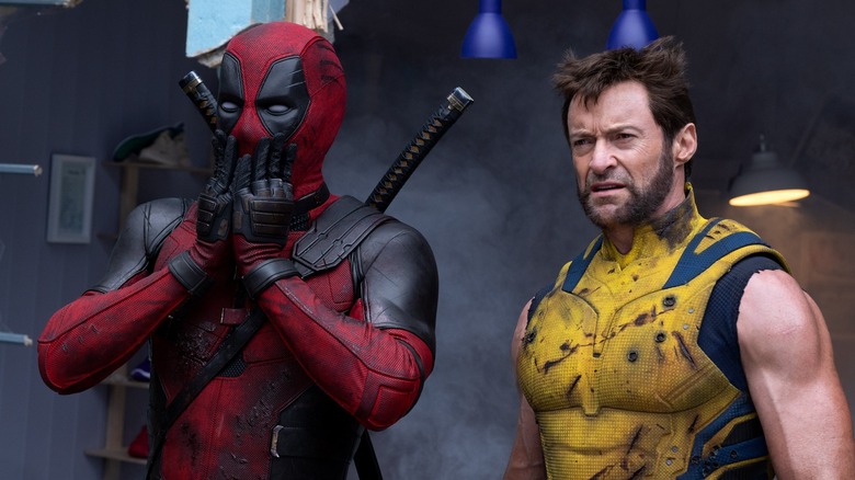 Deadpool surprised and Wolverine confused