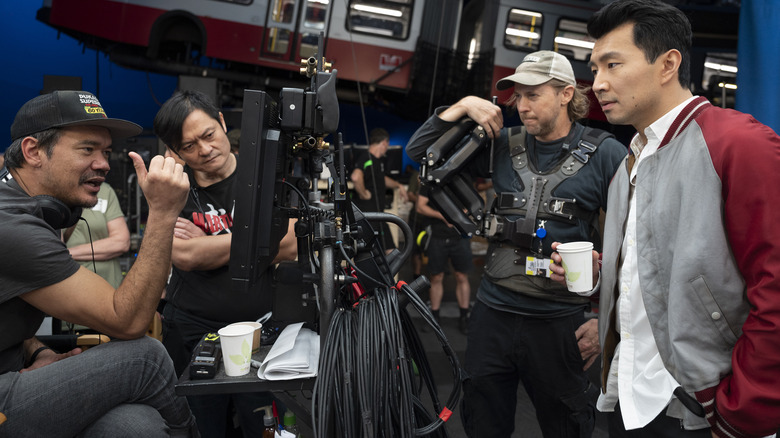 Destin Daniel Cretton and Simu Liu on the set of "Shang-Chi and the Legend of the Ten Rings"