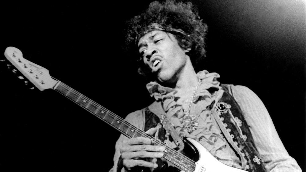 Jimi Hendrix playing guitar