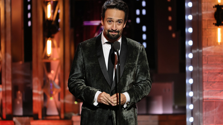 Lin-Manuel Miranda standing near microphone