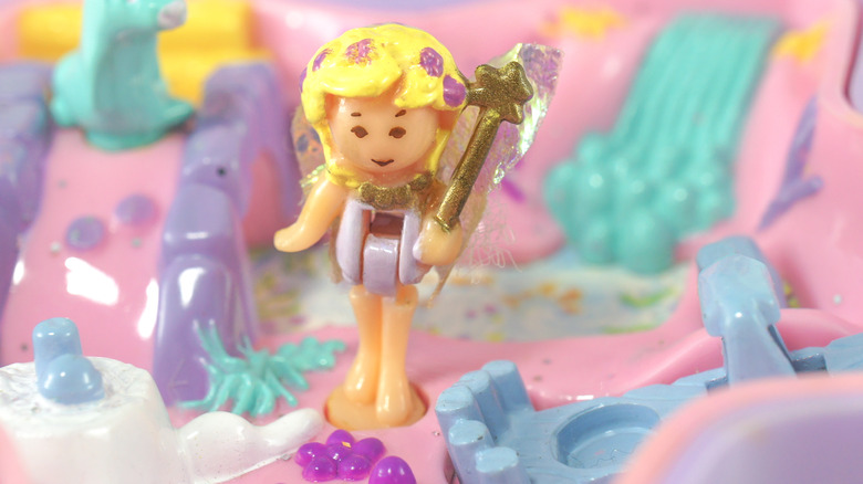 Polly Pocket figure inside clamshell