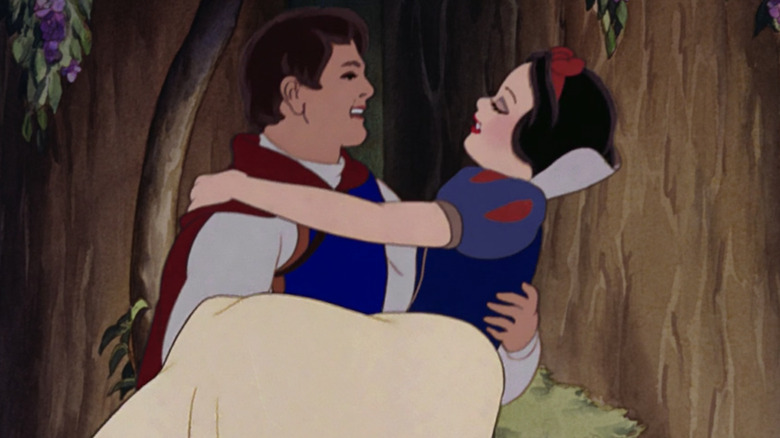 Prince Charming holds Snow White