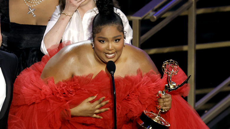 Lizzo accepts an award