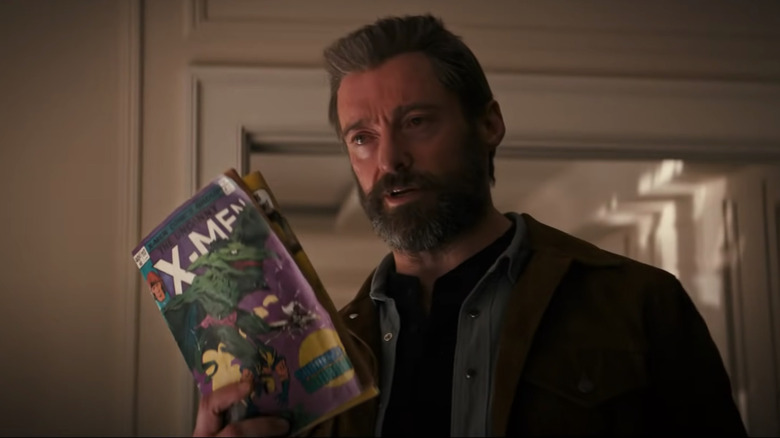 Logan with X-Men comic