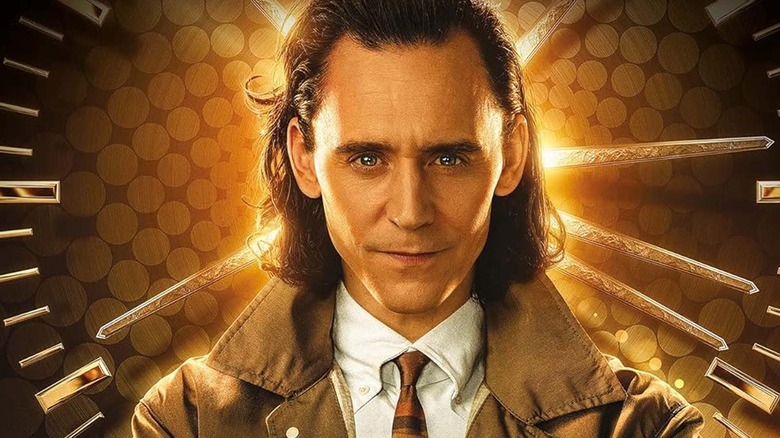 Loki staring in front of gold background