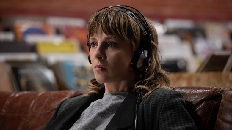 Sylvie wearing headphones