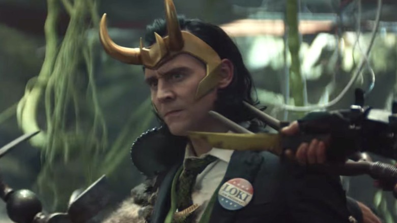 Loki being threatened 