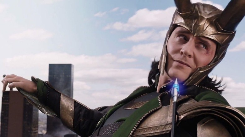 Loki catching Hawkeye's arrow