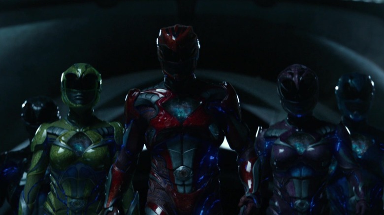 The Power Rangers walking in formation