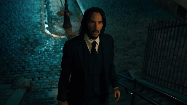 John Wick climbing Montmartre stairs