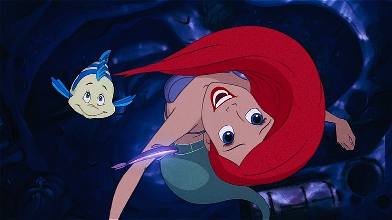 Ariel and Flounder swimming upwards 