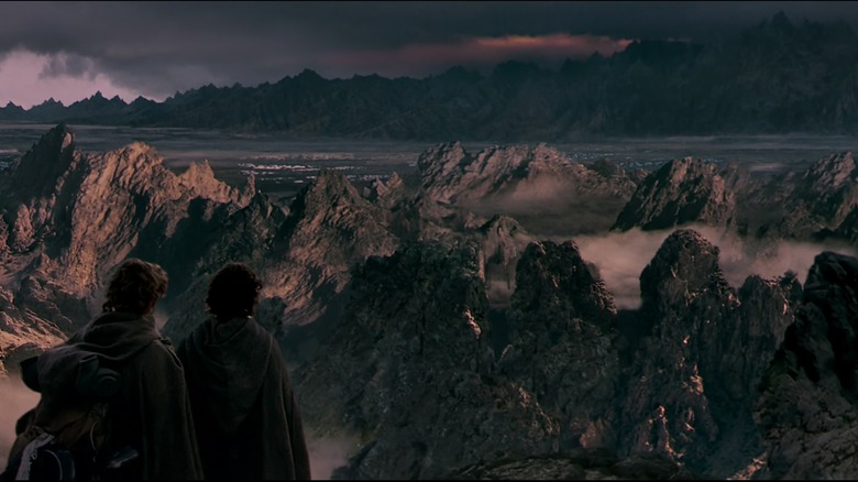 Frodo and Samwise staring at Mordor