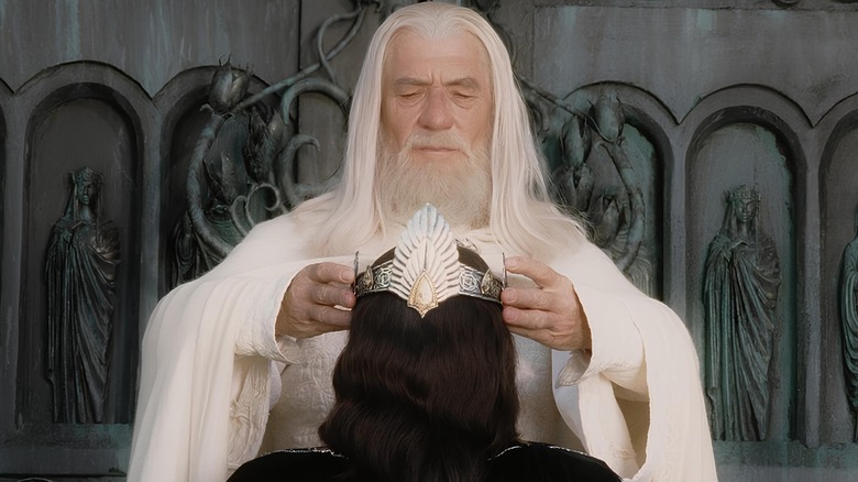 Gandalf putting crown on Aragorn's head