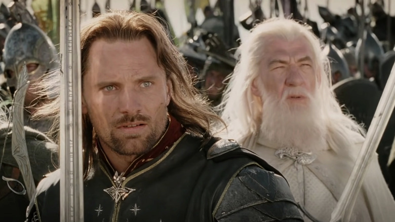 Aragorn and Gandalf look at somehting