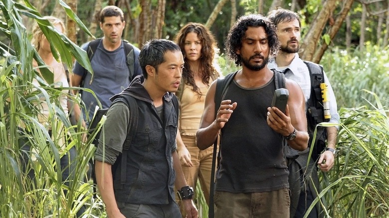 Sayid leading group through jungle 