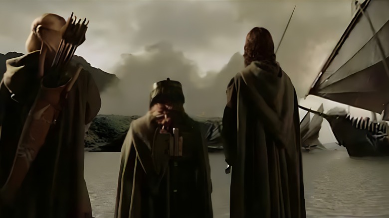 Legolas, Gimli, and Aragorn watch the Black Ships