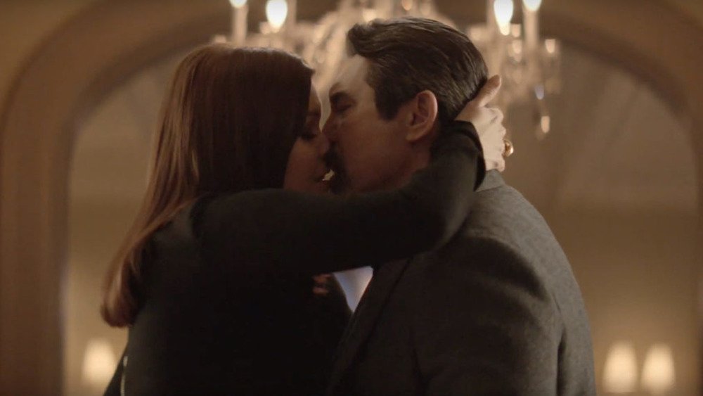 Bellamy Young and Lou Diamond Phillips kiss