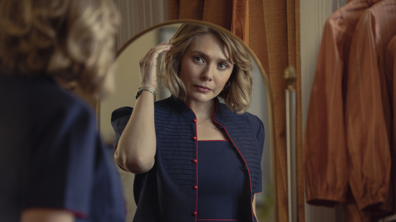 Elizabeth Olsen looking in mirror