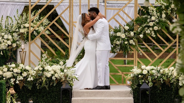 Chelsea Griffin and Kwame Appiah kissing