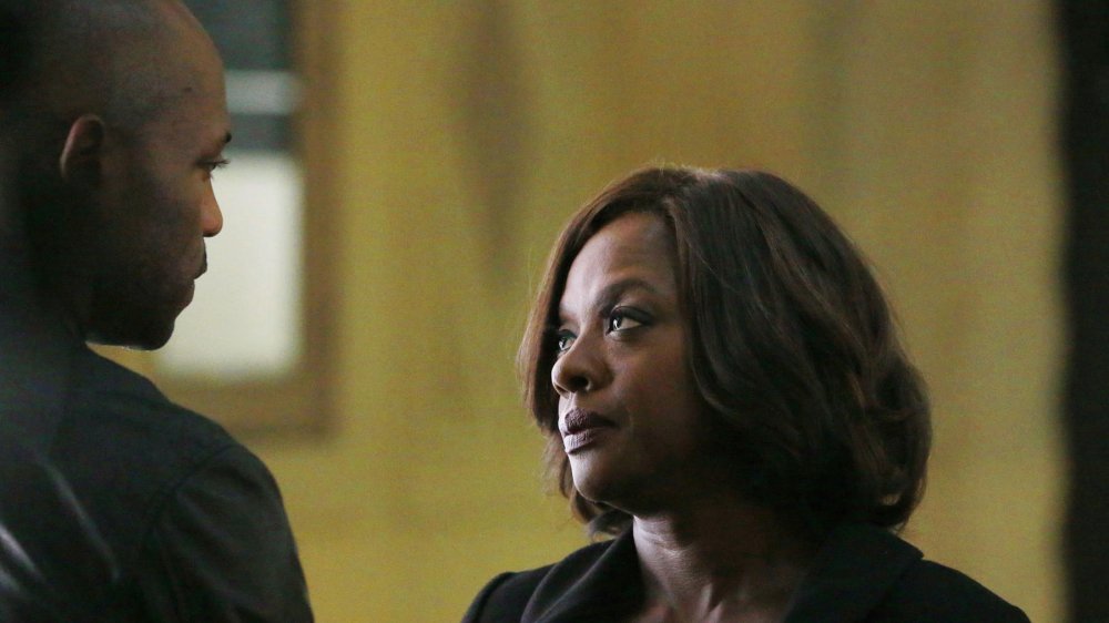 Viola Davis as Annalise Keating looks up at Billy Brown as Nate Lahey in How to Get Away with Murder