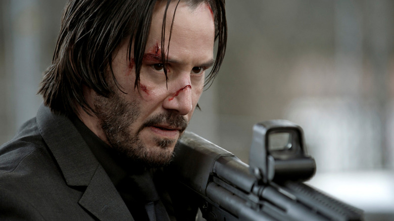 John Wick holding gun