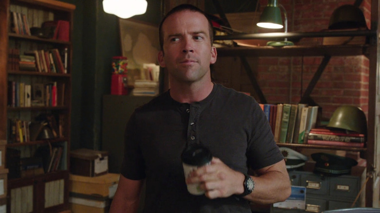 Lucas Black holding coffee